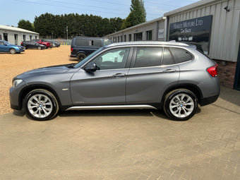 compare product BMW X 1 auto x drive SE